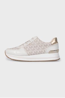 Beige sneakers with a signature print