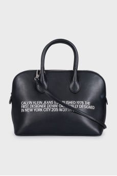 Black leather tote with text print