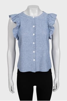 Light blue sleeveless blouse with ruffles