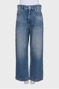 Blue straight leg distressed jeans