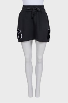 Black skirt with branded patches