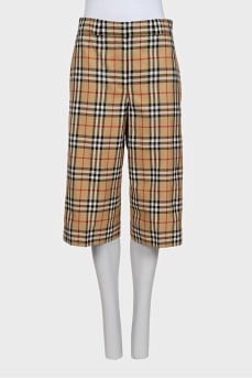 Long wool shorts with signature print