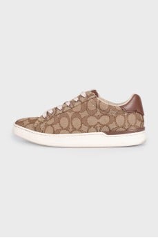 Brown textile sneakers with a signature print