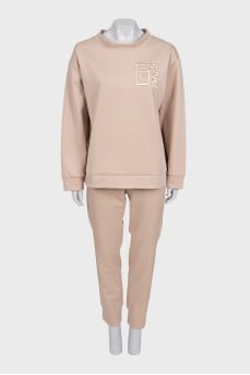 Beige tracksuit with tag