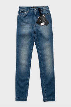 Blue skinny fit jeans with a distressed effect