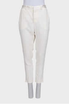 White tapered trousers with elastic waistband