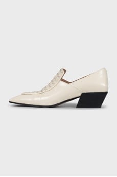 White leather shoes with signature weave