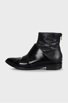 Black leather pointed toe boots