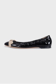 Patent leather ballet flats with a bow