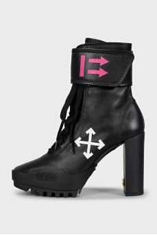Black ankle boots with print