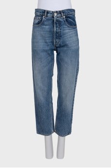 High-waisted blue jeans with distressing