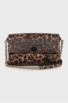 Animal print leather bag with tag
