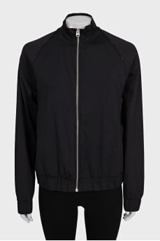 Black bomber jacket with a silver zipper