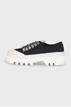 Black textile sneakers with a chunky platform