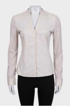 Beige fitted blouse with long sleeves
