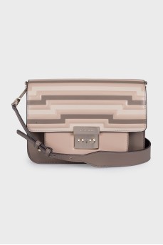 Beige leather bag with a 3D print