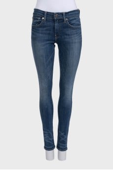 Blue skinny fit jeans with a distressed effect