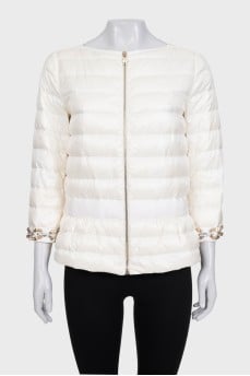 White quilted down jacket with decorative sleeves