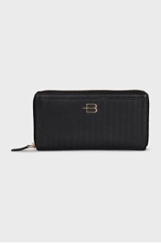 Black leather wallet with tag