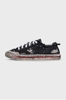 Textile sneakers with a distressed effect