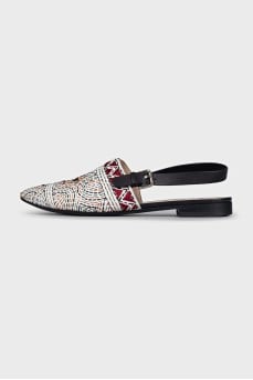 White slingbacks with multi-colored embroidery