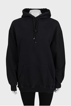 Black loose-fitting hoodie with logo