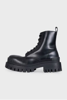 Black leather boots with chunky soles