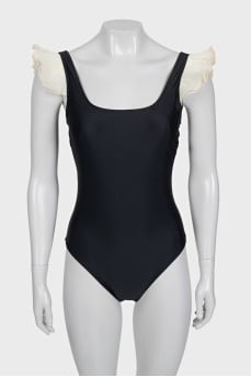 Black ruffled swimsuit with tag
