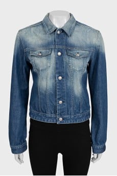 Blue cropped denim jacket with a distressed effect