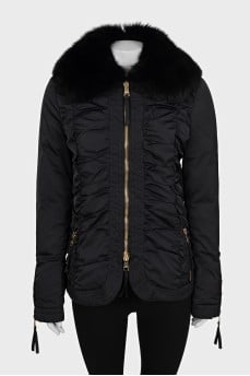 Black fitted down jacket with a fur collar