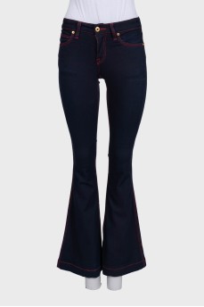 Blue flared jeans with contrast seams