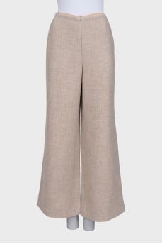 Beige wide-leg trousers with a zipper