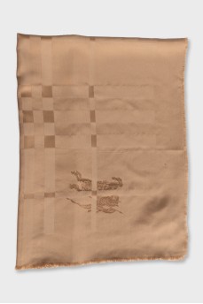 Brown scarf with branded print and tag