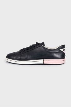 Leather sneakers with a logo on the heel