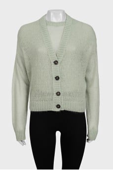 Green set with a cardigan with a tag
