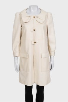 Beige leather coat with accent shoulders