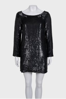 Black dress decorated with sequins with long sleeves