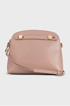 Pink leather bag with gold buttons