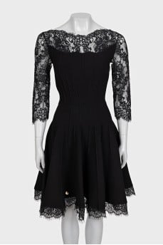 Black fitted dress decorated with lace