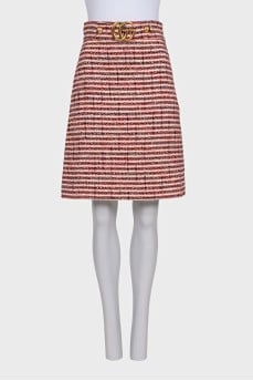 Midi skirt decorated with a gold logo