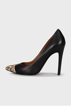 Black shoes with a printed toe and metallic embellishments