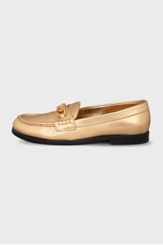 Gold leather loafers
