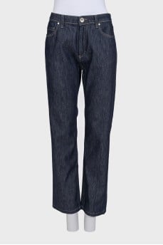 Dark blue jeans with embroidery on the pocket