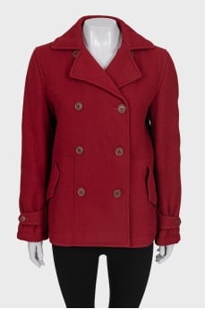 Red double-breasted coat with a short cut