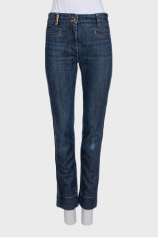 Blue straight-leg jeans with a mid-rise