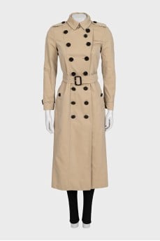 Beige fitted button-down trench coat with belt