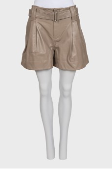 Gray leather shorts with a belt with a tag