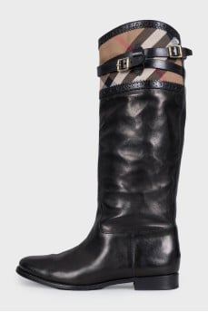 Black leather boots with a textile insert in the signature print