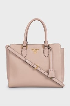 Beige leather tote bag with magnetic closure