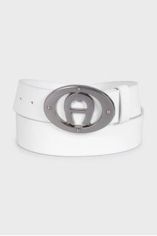 White leather belt with a massive buckle